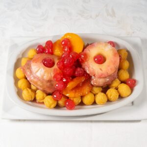 Carré de cerdo frutado con papas noissettes